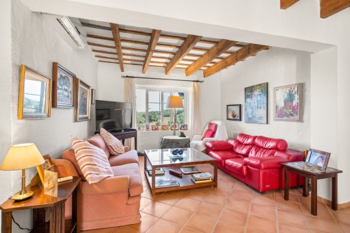 Cosy living room with wooden ceiling beams