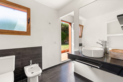 Modern bathroom with garden access