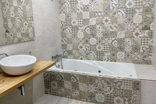 Renovated bathroom with bathub