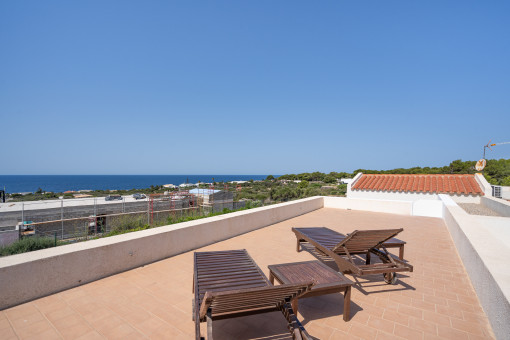 Toit-terrasse avec vue sur la mer